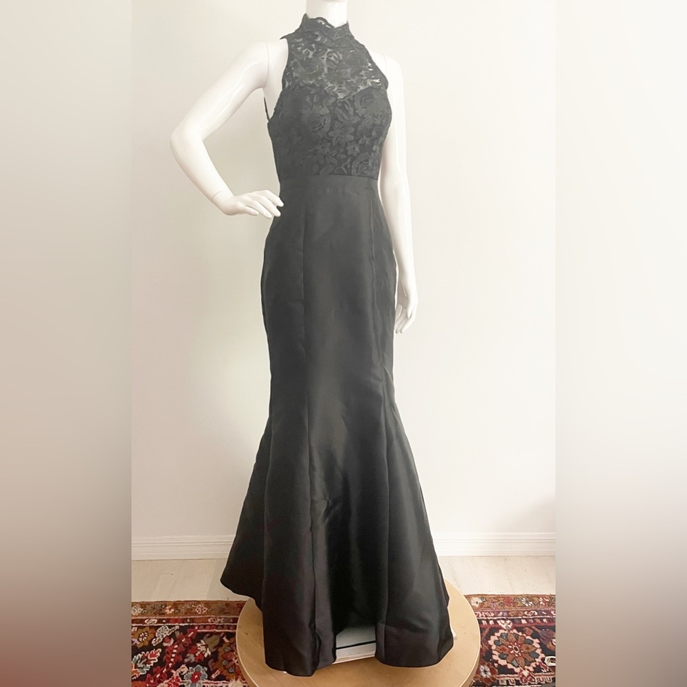 Black halter gown, lace bodice, open back, mermaid hem, made in US
